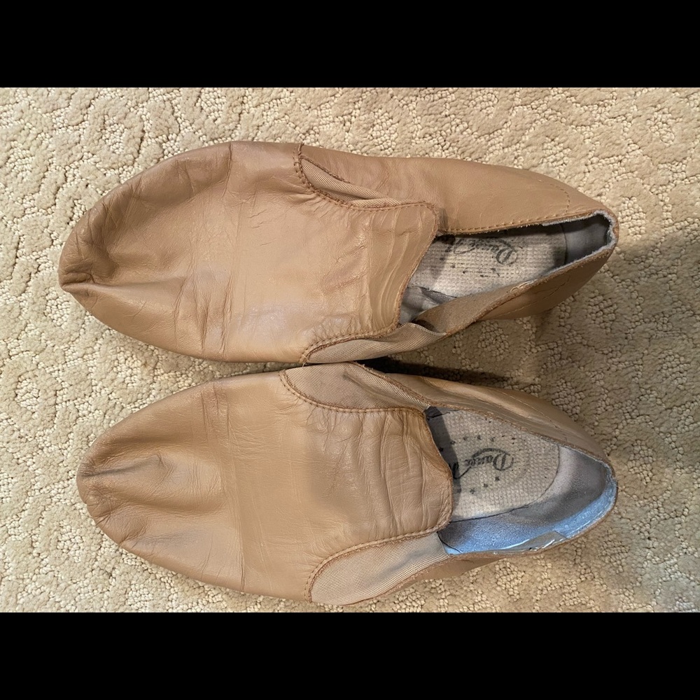 Tan jazz shoes and foot undies